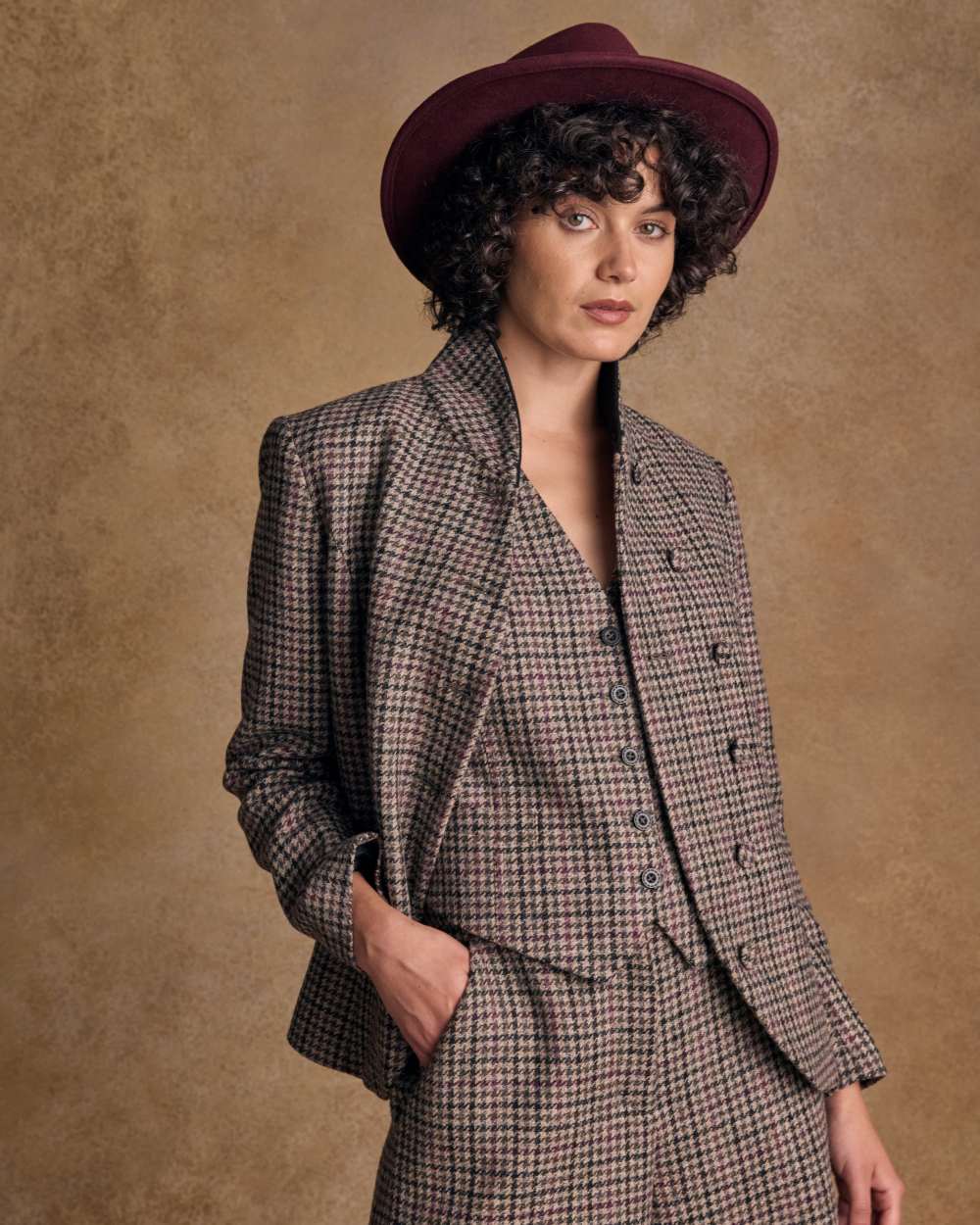 Burgundy Coloured Jack Murphy Boston Crushable Felt Hat on indoor background