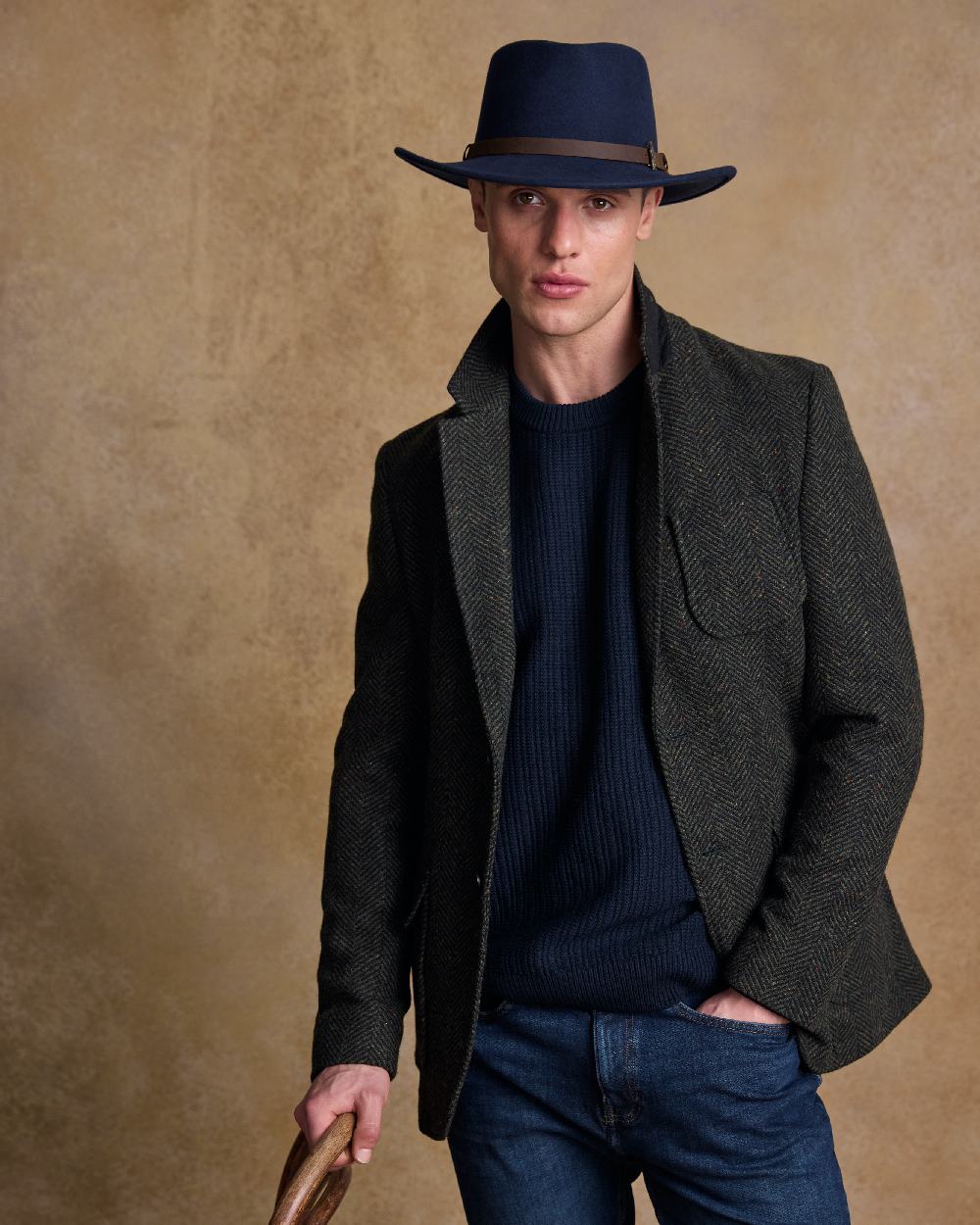 Navy Coloured Jack Murphy Boston Crushable Felt Hat on indoor background