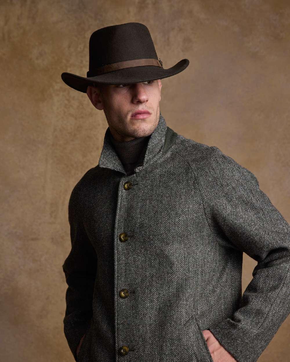 Olive Coloured Jack Murphy Boston Crushable Felt Hat on indoor background