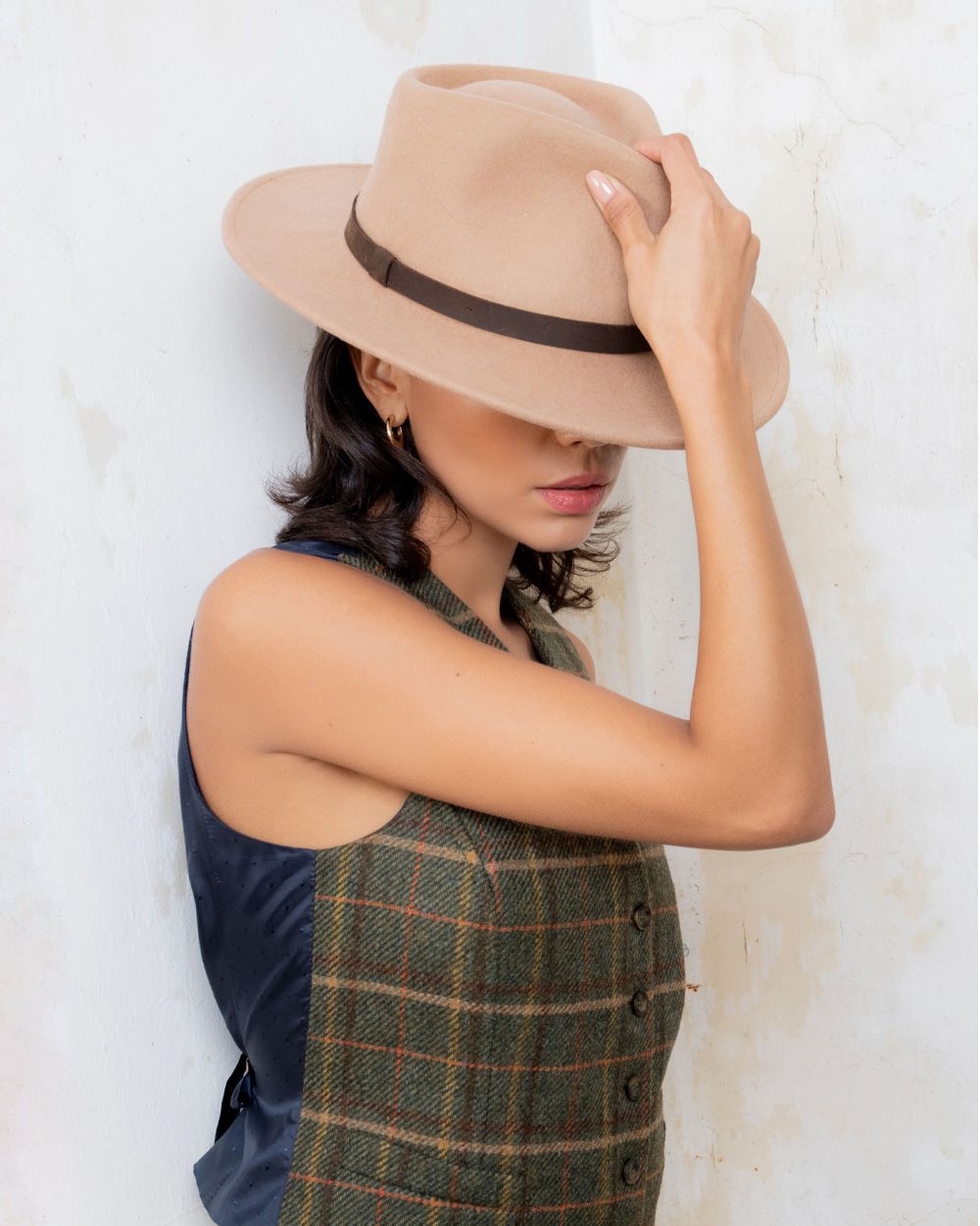 Tan coloured Jack Murphy Boston Crushable Felt Hat on wall background