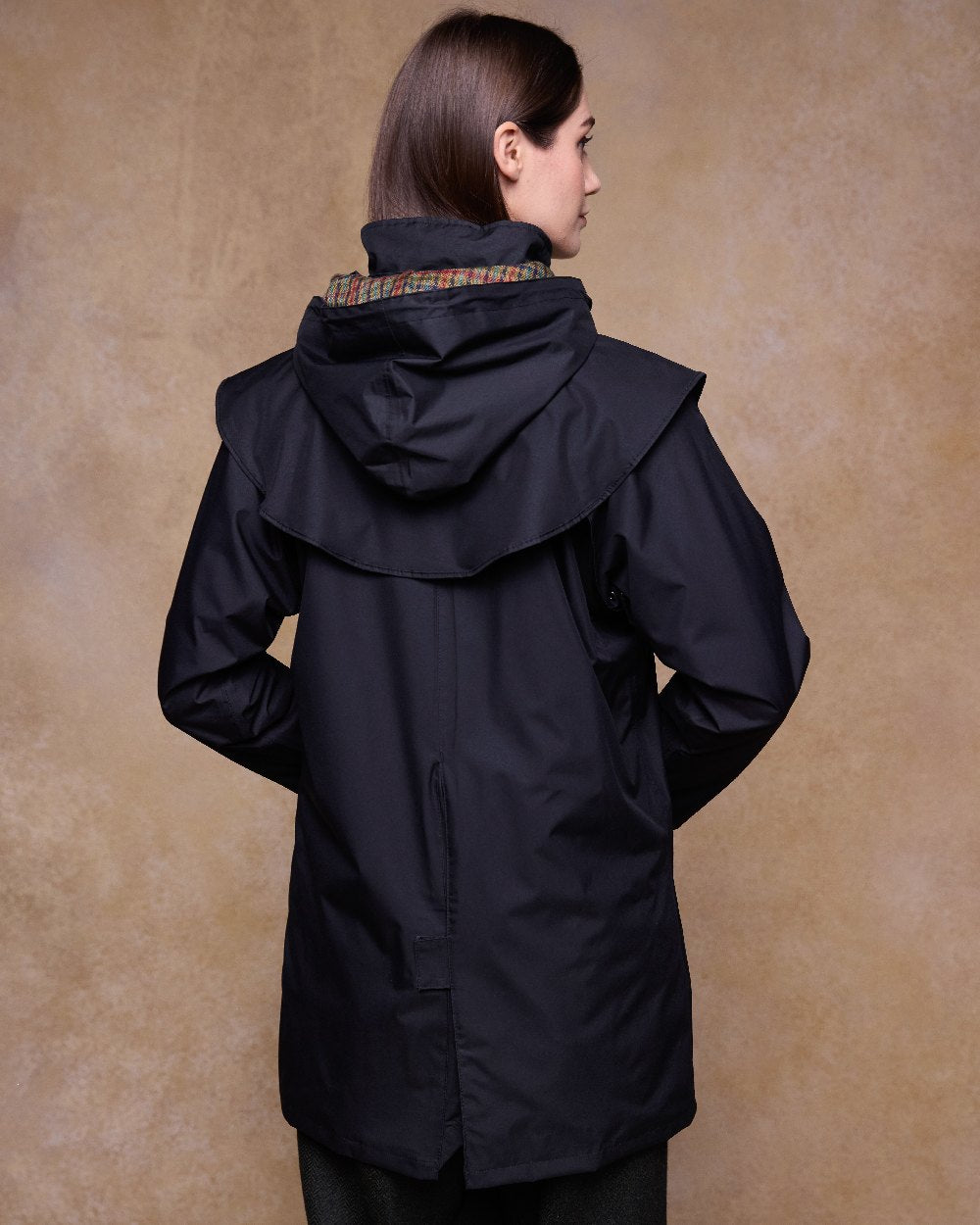 Black Coloured Jack Murphy Cotswold Ladies Waterproof 3/4 Coat on indoor background