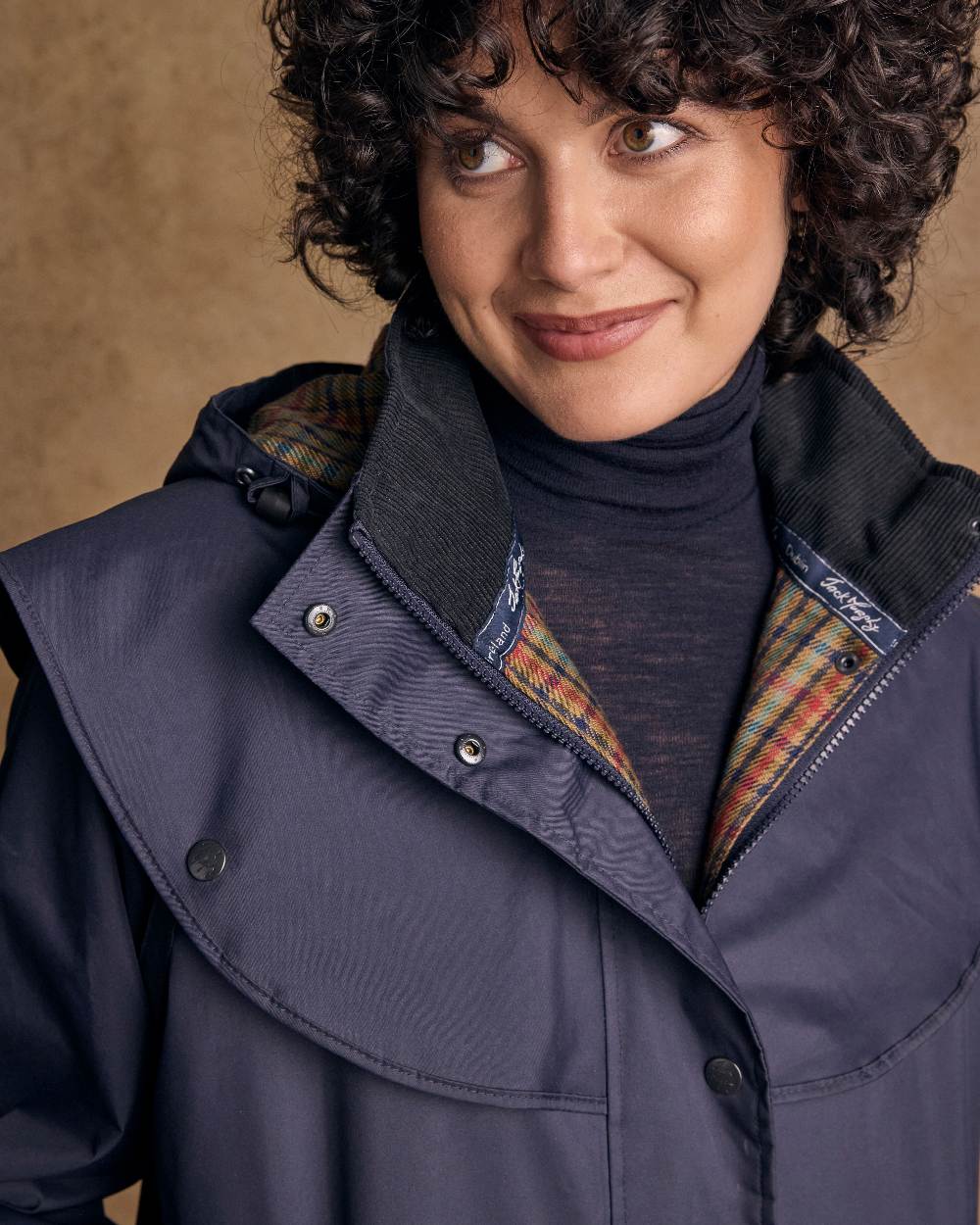 Heritage Navy Coloured Jack Murphy Cotswold Ladies Waterproof 3/4 Coat on indoor background