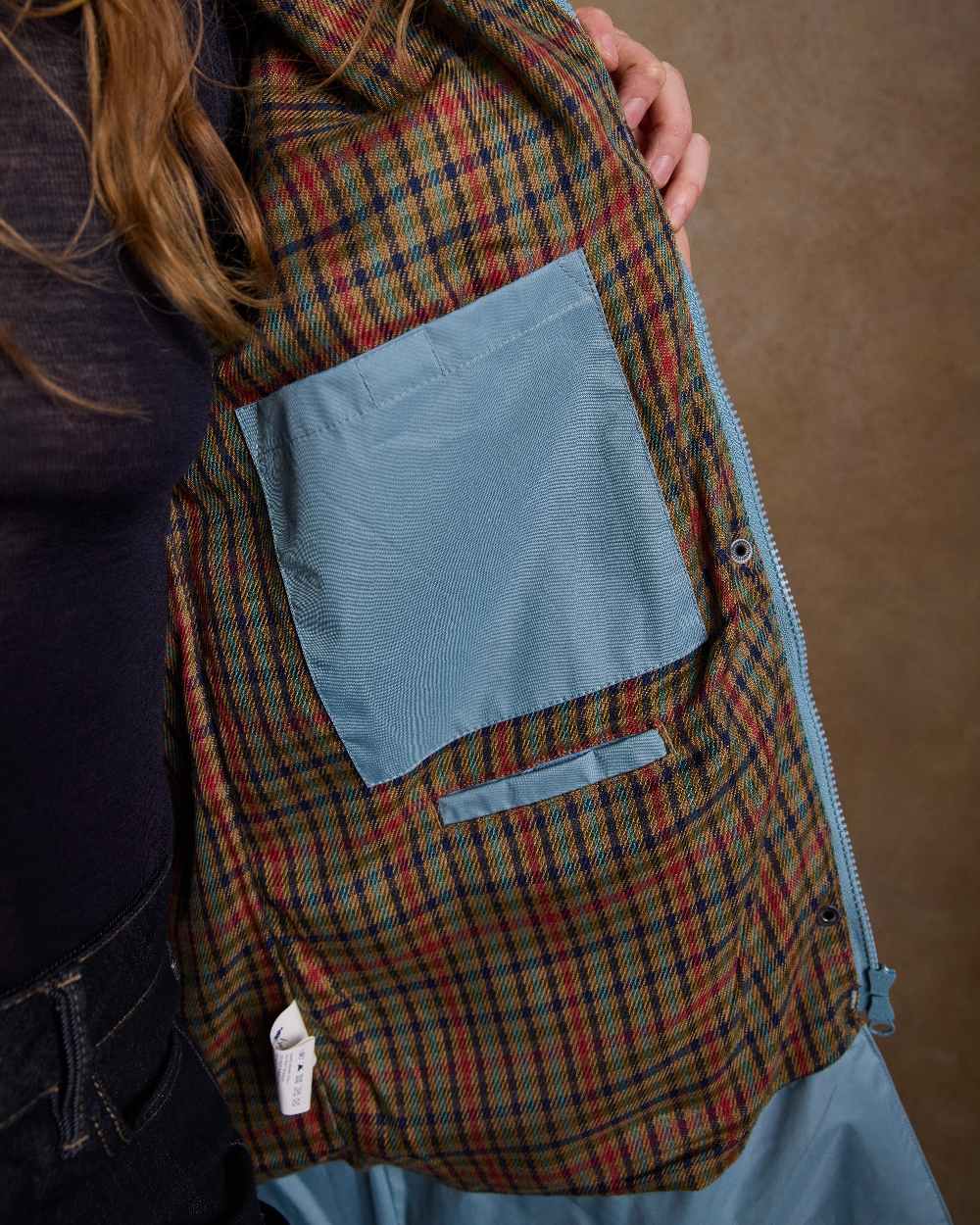 Smoke Blue Coloured Jack Murphy Cotswold Ladies Waterproof 3/4 Coat on indoor background