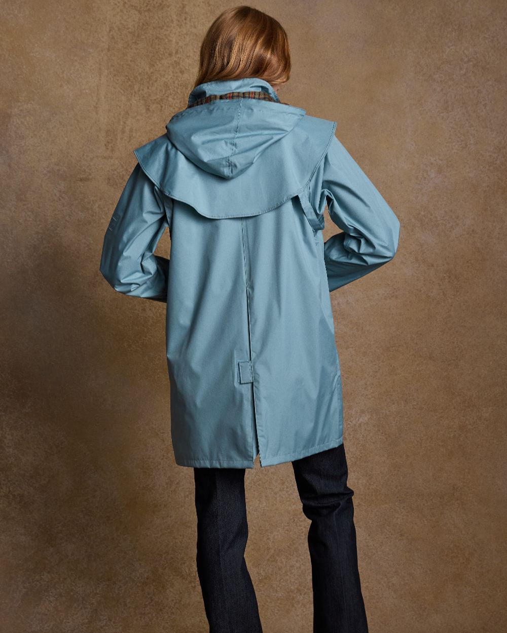Smoke Blue Coloured Jack Murphy Cotswold Ladies Waterproof 3/4 Coat on indoor background