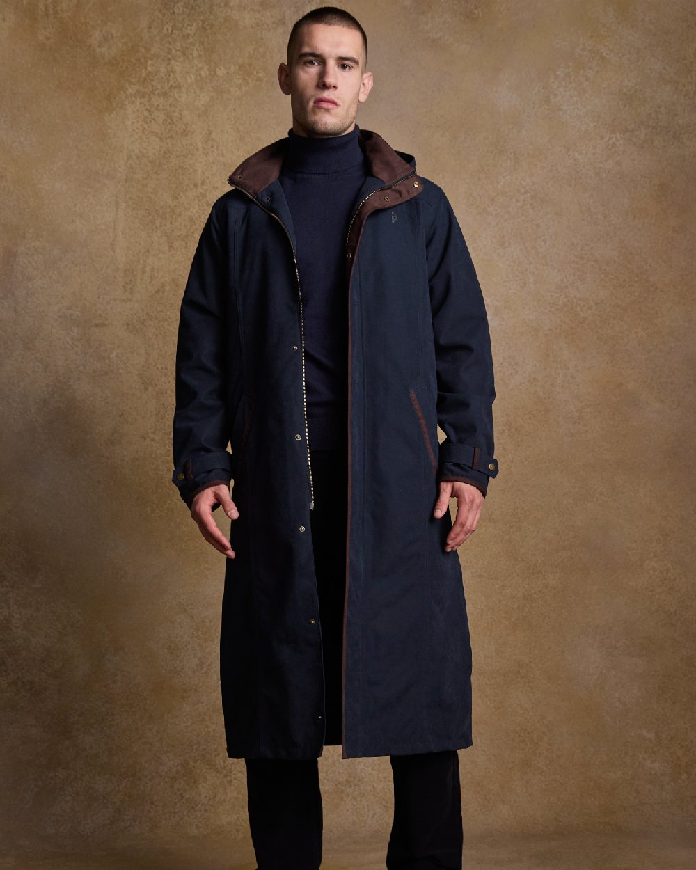 Navy Coloured Jack Murphy Emmet Waterproof Long Coat on indoor background