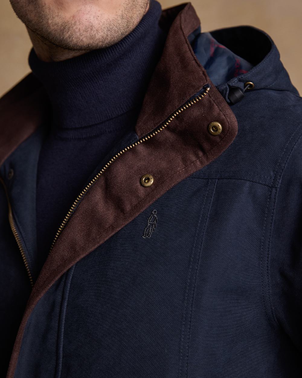 Navy Coloured Jack Murphy Emmet Waterproof Long Coat on indoor background