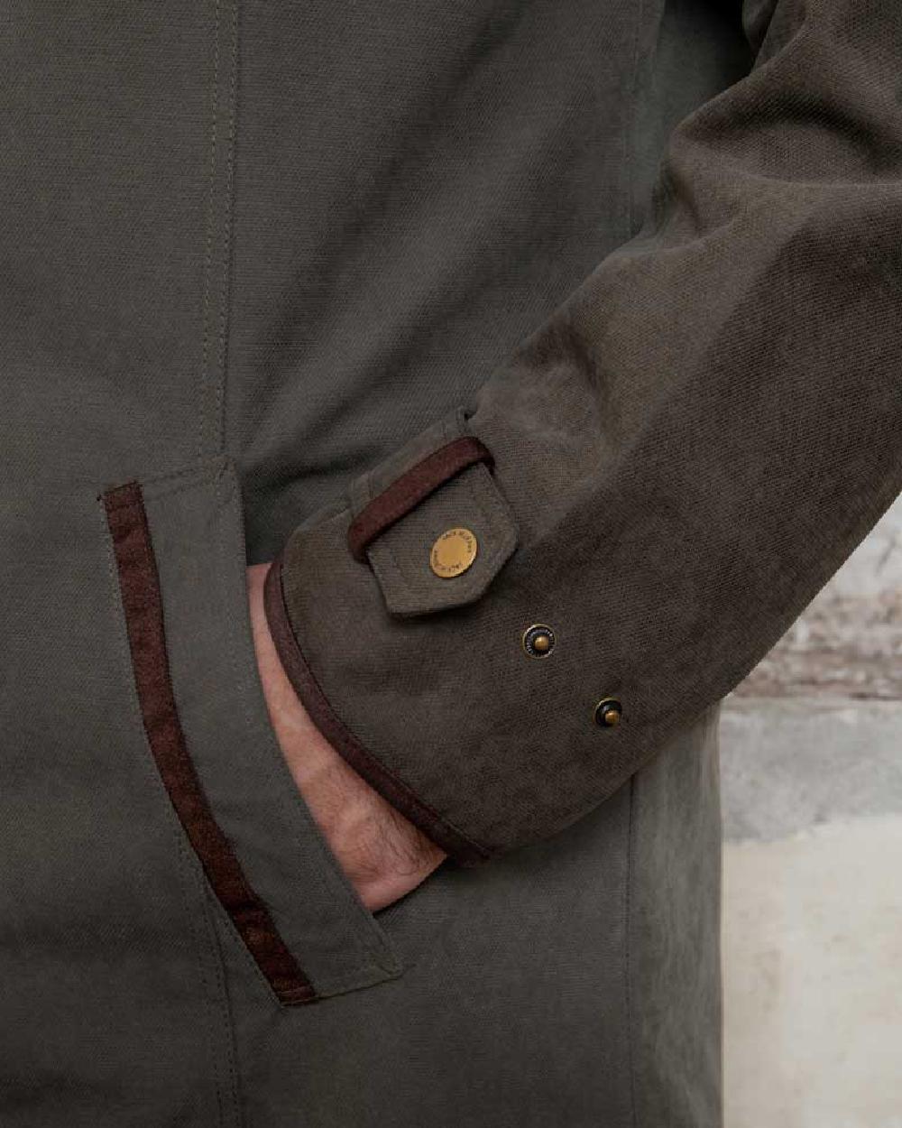 Olive Jack Murphy Emmet Waterproof Long Coat on wall background