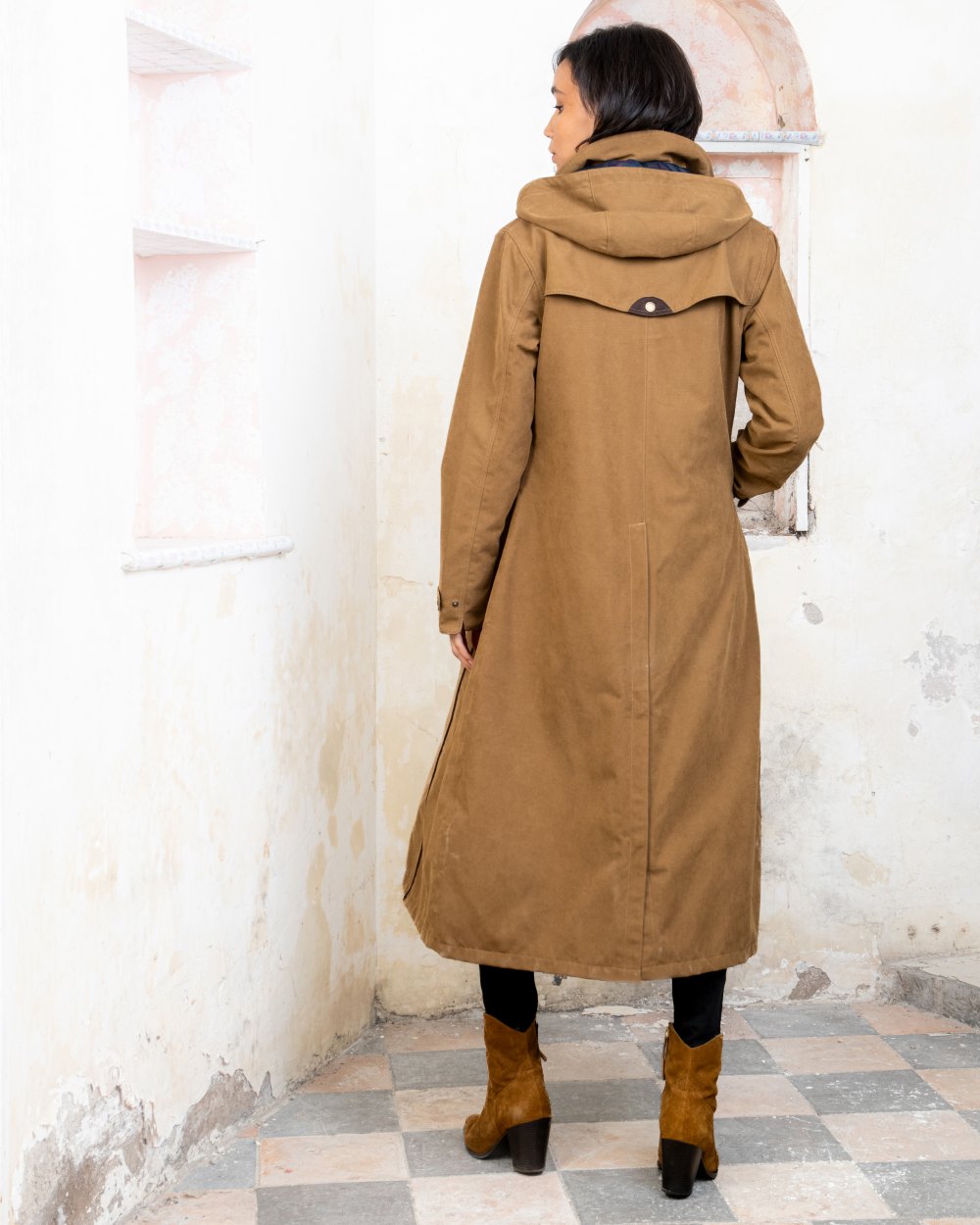 Camel coloured Jack Murphy Erin Long Waterproof Coat on wall background