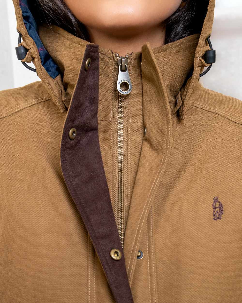 Camel coloured Jack Murphy Erin Long Waterproof Coat on wall background