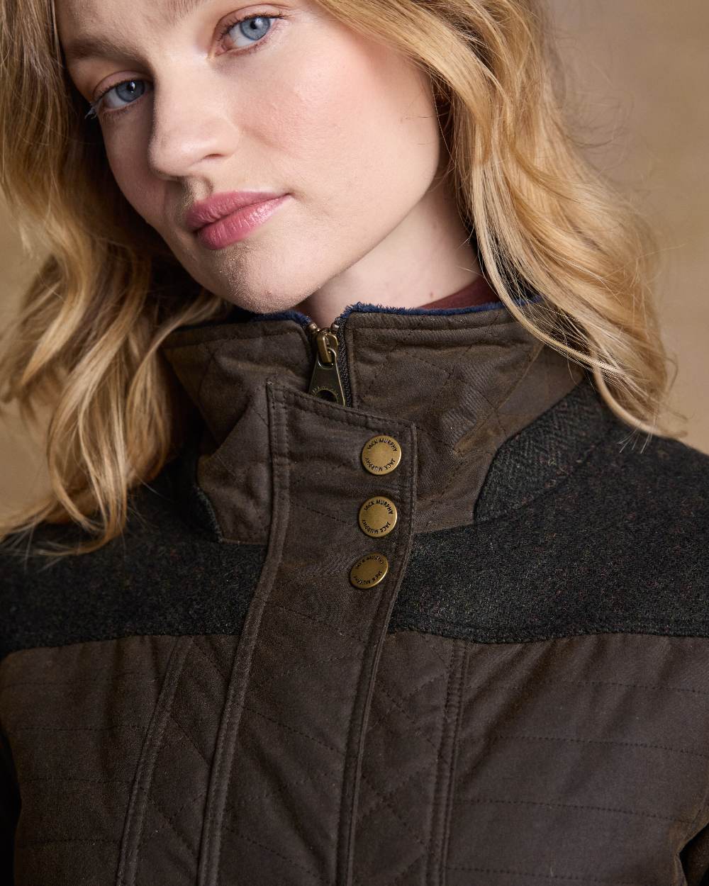 Olive Coloured Jack Murphy Jodie Wax Coat on indoor background