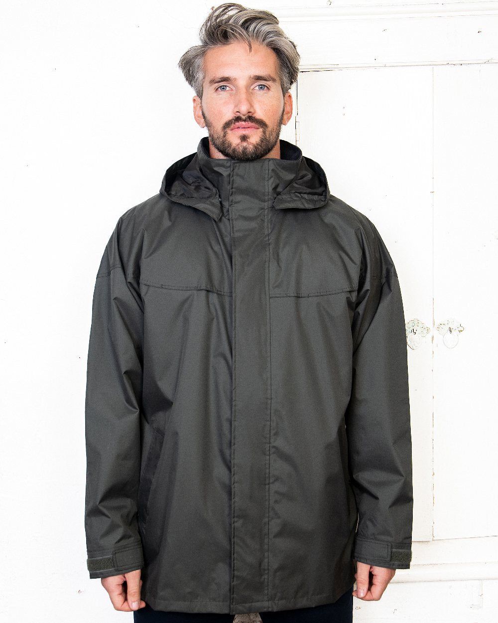 Olive Coloured Jack Murphy Kingston Waterproof Jacket on studio background