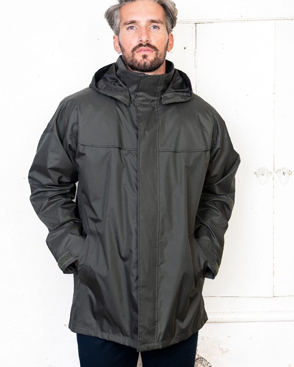Olive Coloured Jack Murphy Kingston Waterproof Jacket on studio background