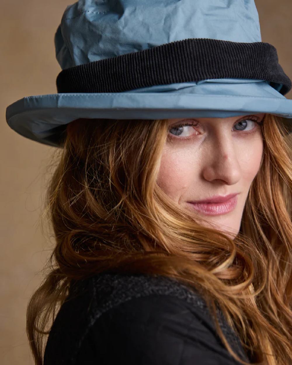 Smoke Blue coloured Jack Murphy Malvern Heritage Rain Hat on wall background