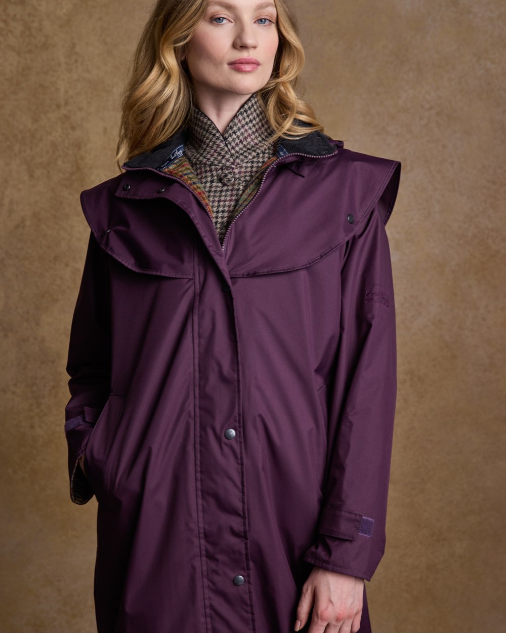 Blackberry Coloured Jack Murphy Malvern Ladies Waterproof Bush Coat on indoor background