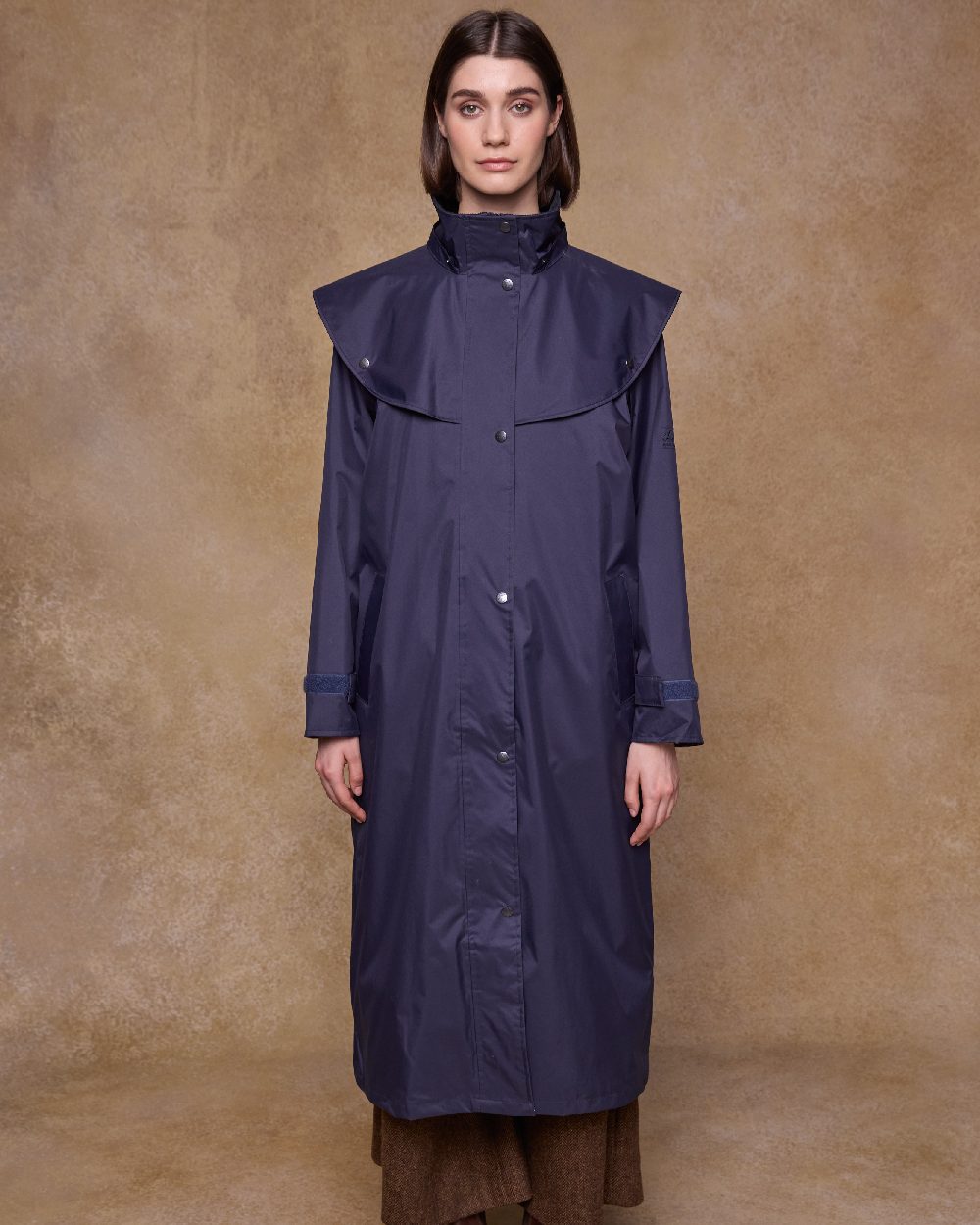 Heritage Navy Coloured Jack Murphy Malvern Ladies Waterproof Bush Coat on indoor background