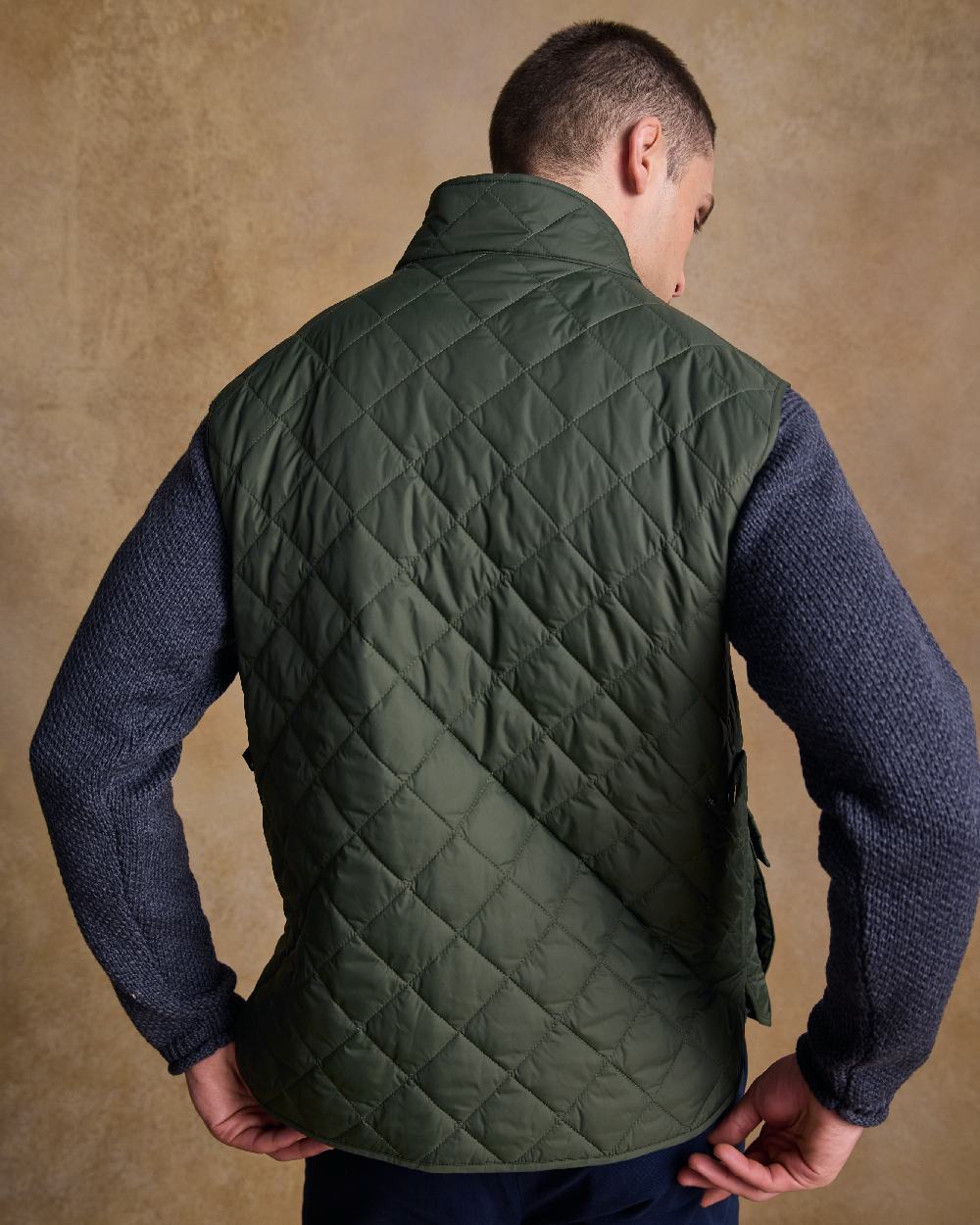 Olive Coloured Jack Murphy Mens Conor Quilted Gilet on indoor background
