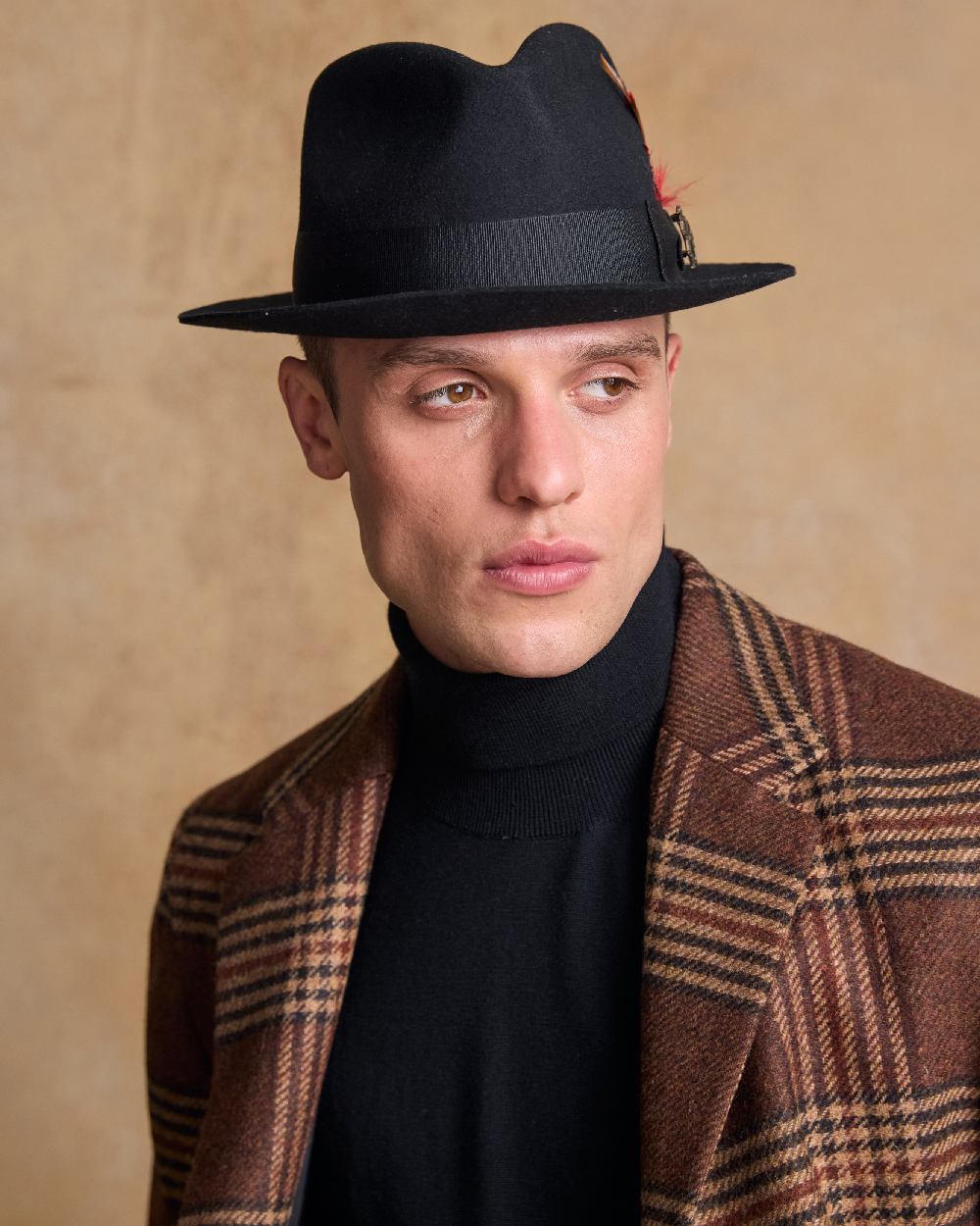 Black Coloured Jack Murphy Mens Kildare Trilby Felt Hat on indoor background