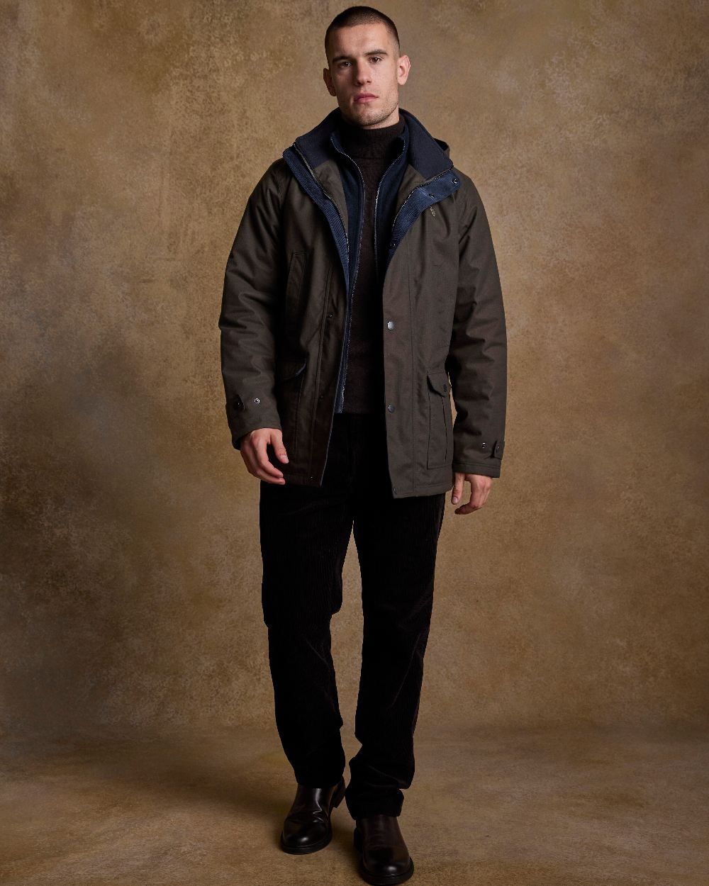 Olive Coloured Jack Murphy Mens Michael Waterproof Jacket on indoor background