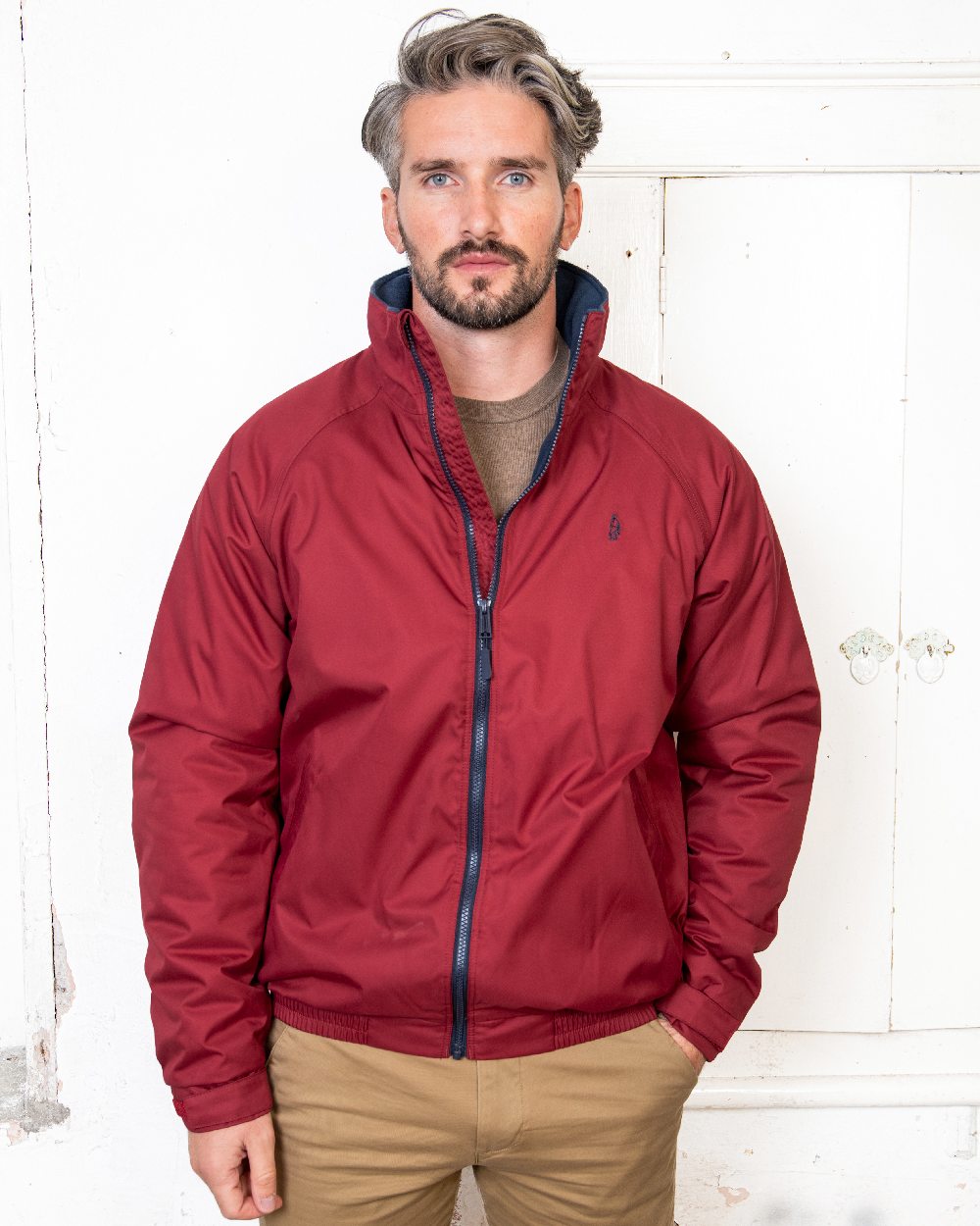 Red Coloured Jack Murphy Mens Rockall Waterproof Jacket on indoor background