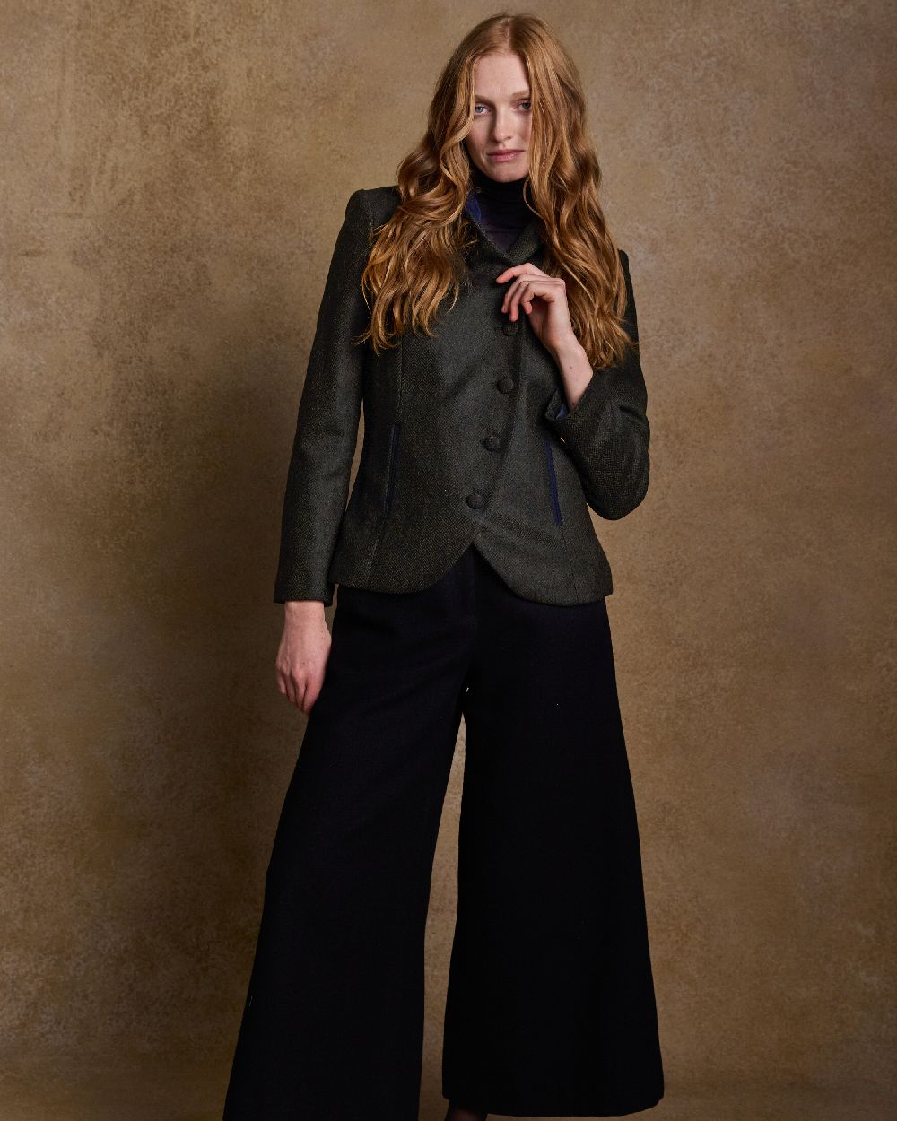 Deep Green Herringbone Coloured Jack Murphy Nicole Ladies Tweed Jacket on indoor background