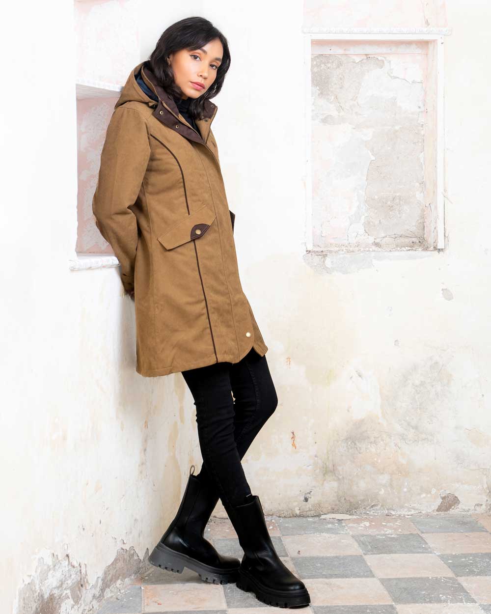 Camel coloured Jack Murphy Una 3/4 Waterproof Coat on wall background