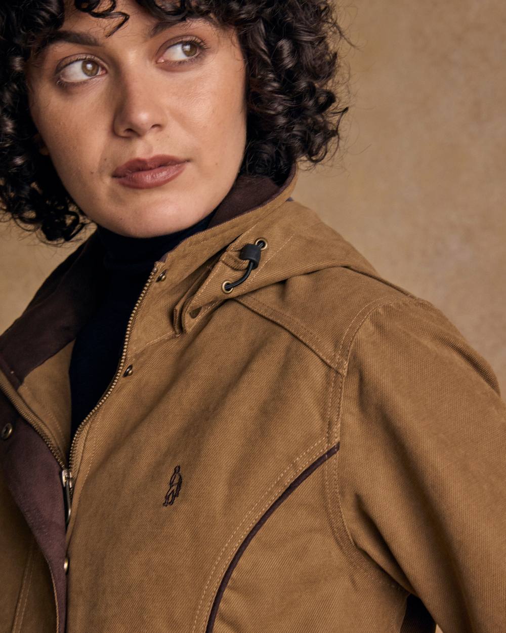 Camel Coloured Jack Murphy Una 3/4 Waterproof Coat on indoor background