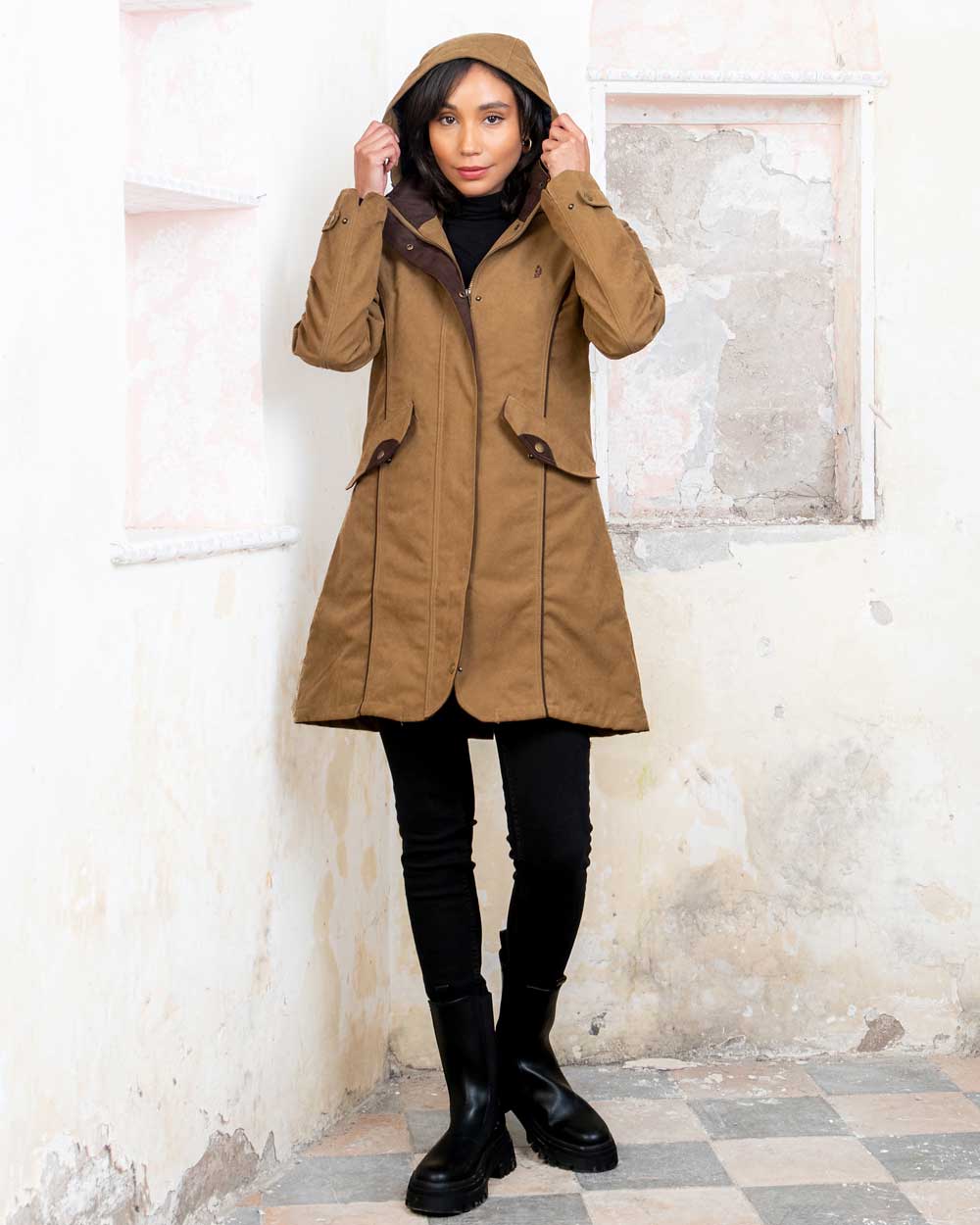 Camel coloured Jack Murphy Una 3/4 Waterproof Coat on wall background