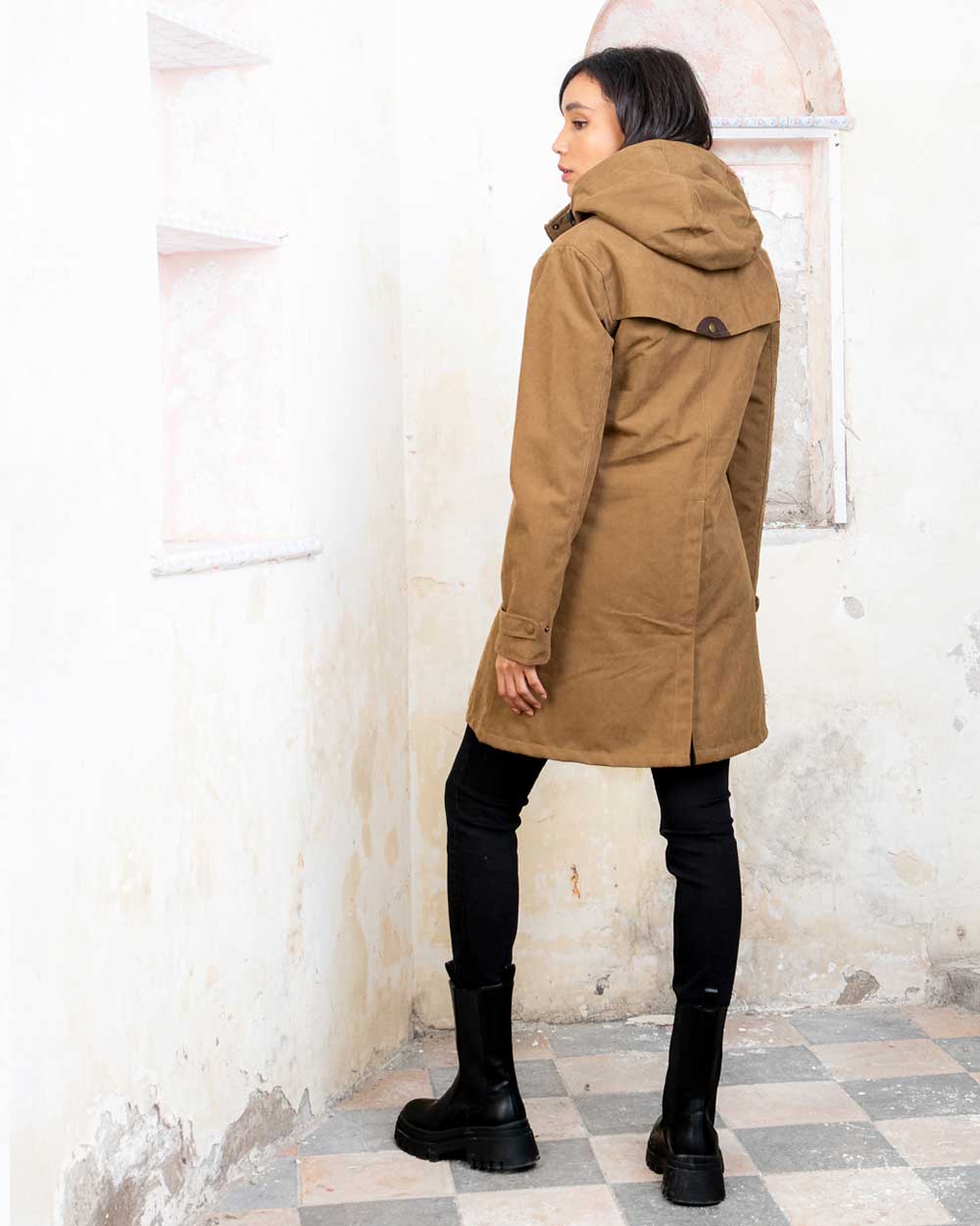 Camel coloured Jack Murphy Una 3/4 Waterproof Coat on wall background