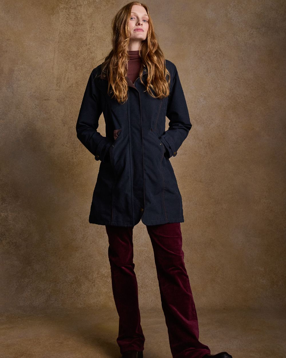 Heritage Navy Coloured Jack Murphy Una 3/4 Waterproof Coat on indoor background