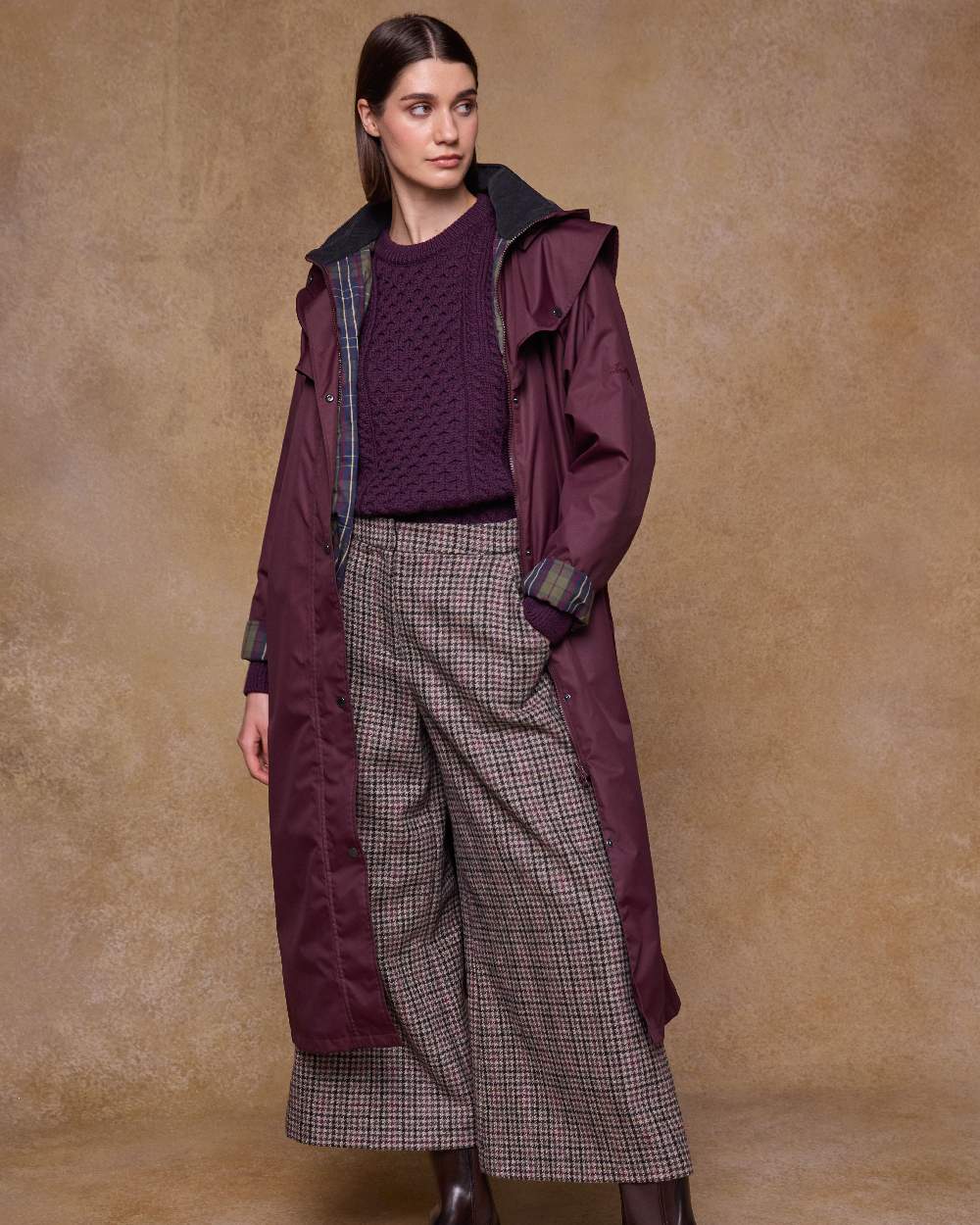 Deep Claret Coloured Jack Murphy Womens Connemara Waterproof Coat on indoor background