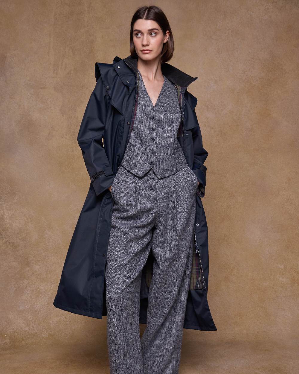 Navy Coloured Jack Murphy Womens Connemara Waterproof Coat on indoor background