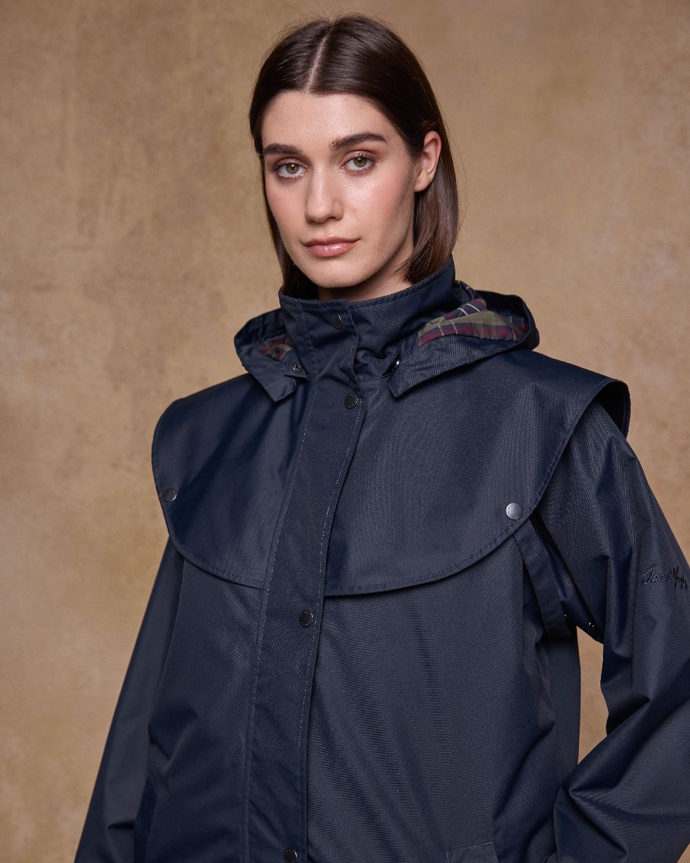 Navy Coloured Jack Murphy Womens Connemara Waterproof Coat on indoor background