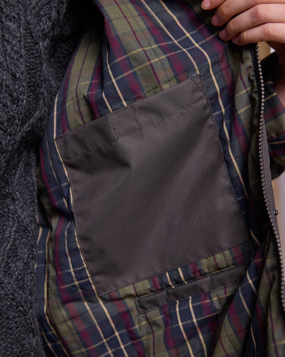 Olive Coloured Jack Murphy Womens Dingle Waterproof Jacket on indoor background