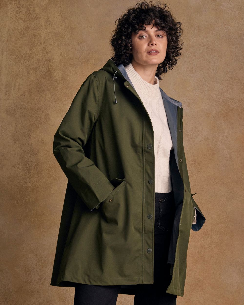Olive Coloured Jack Murphy Womens Fiadh Waterproof Jacket on indoor background