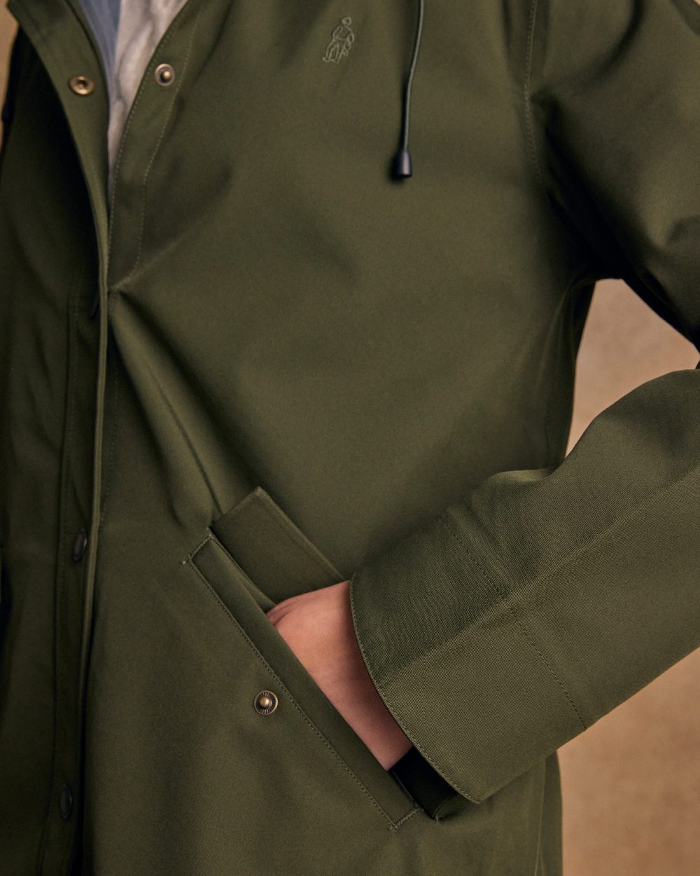 Olive Coloured Jack Murphy Womens Fiadh Waterproof Jacket on indoor background