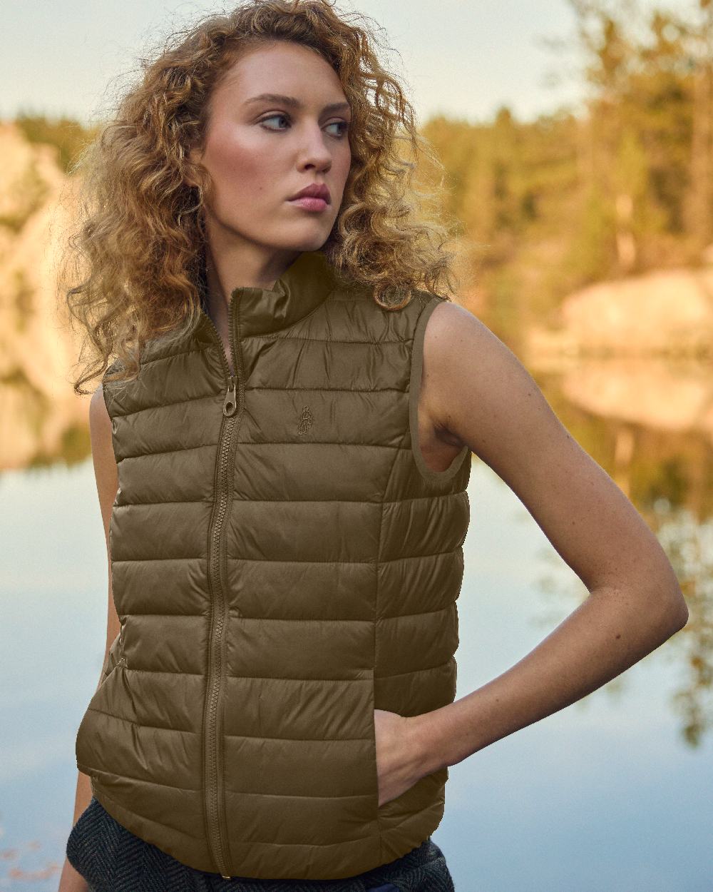 Olive Coloured Jack Murphy Womens Leah Puffa Gilet on outdoor background