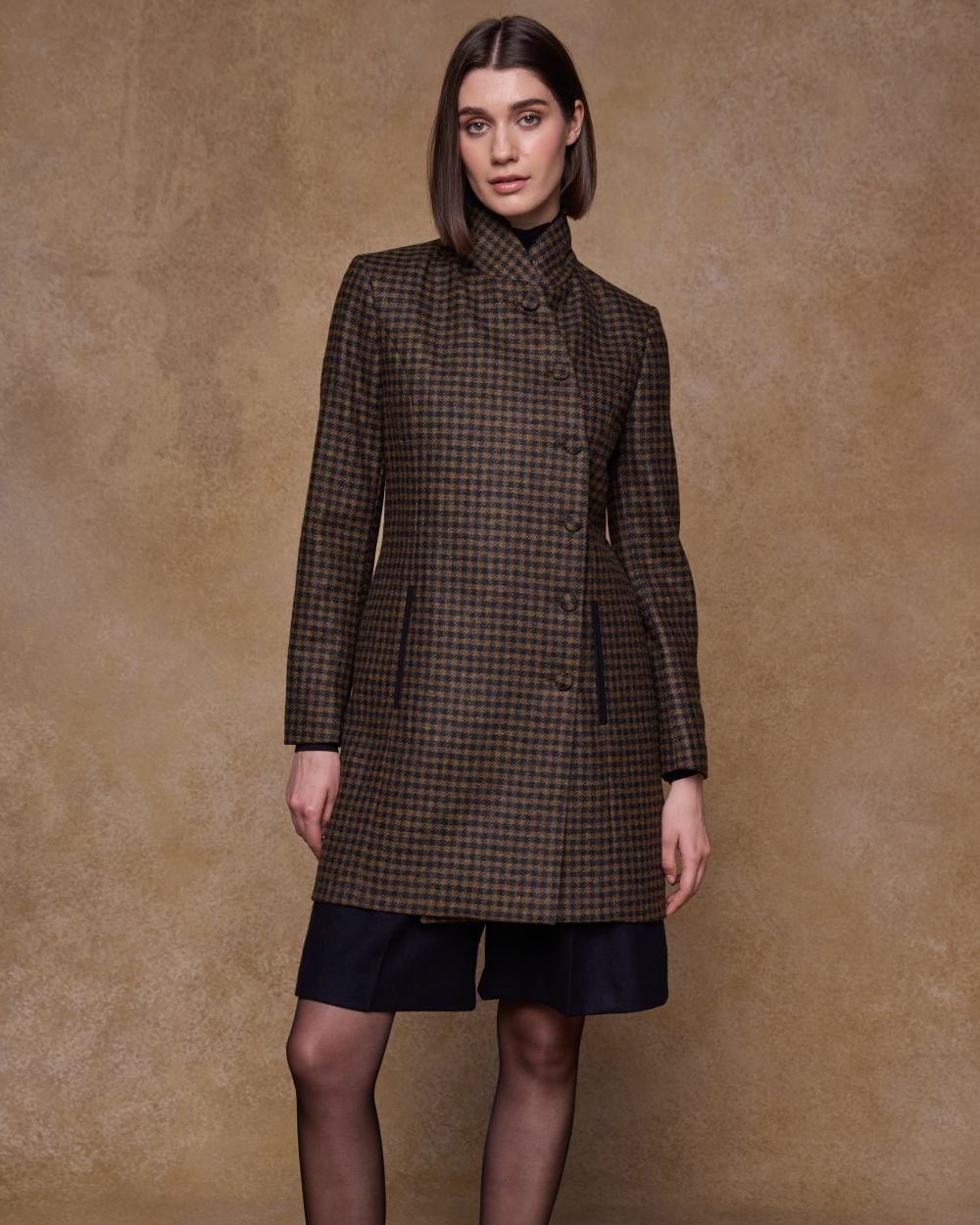 Earth Check coloured Jack Murphy Womens Robin Tweed Coat on textured background