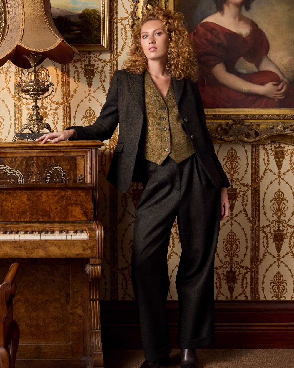 Deep Green Herringbone coloured Jack Murphy Womens Tara Tweed Hacking Jacket on indoor background