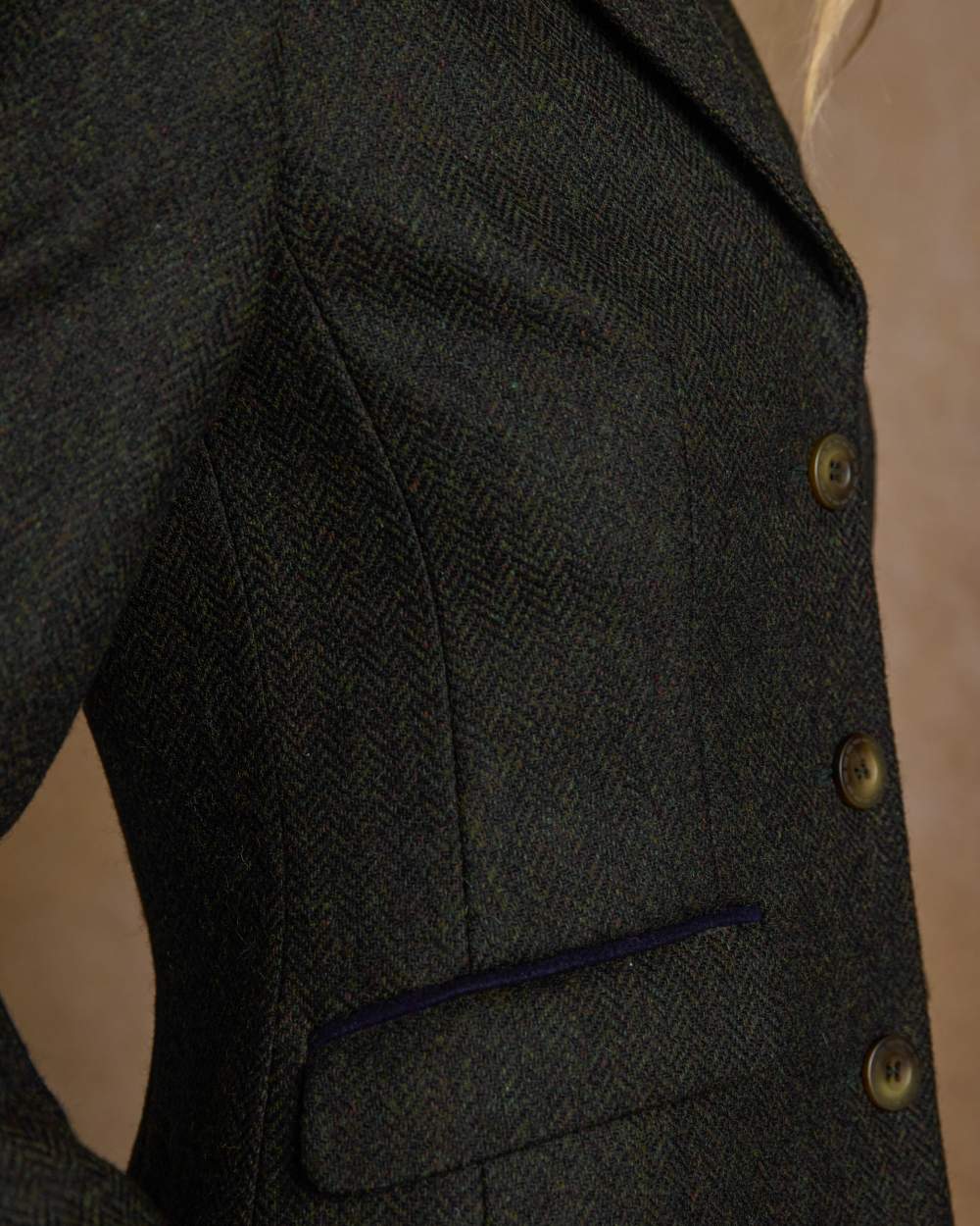 Deep Green Herringbone coloured Jack Murphy Womens Tara Tweed Hacking Jacket on textured