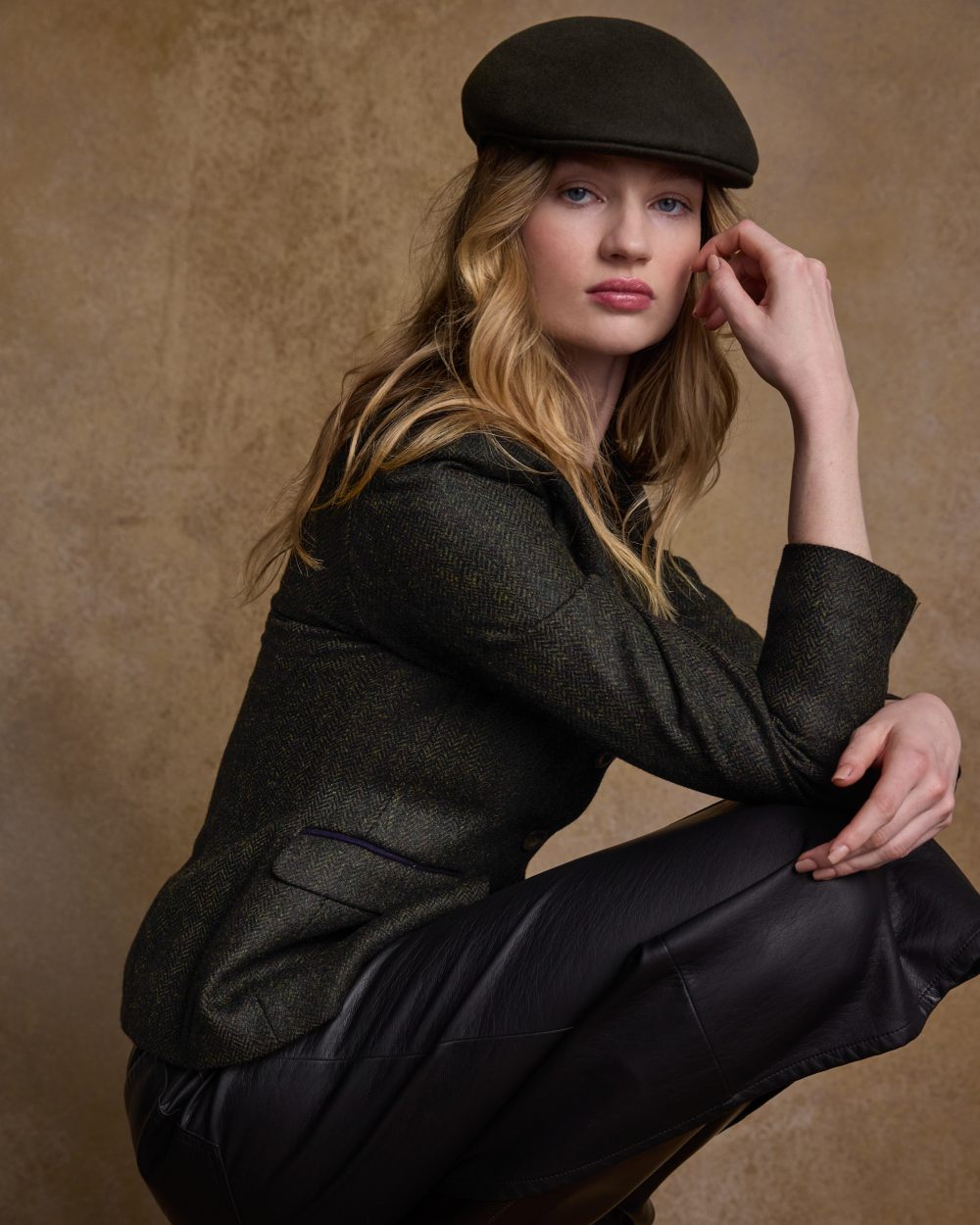 Deep Green Herringbone coloured Jack Murphy Womens Tara Tweed Hacking Jacket on textured