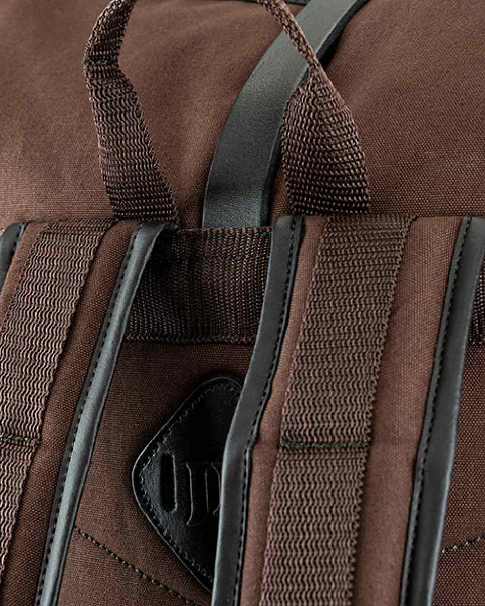 Brown coloured Jack Pyke Canvas Fold Top Rucksack on white background