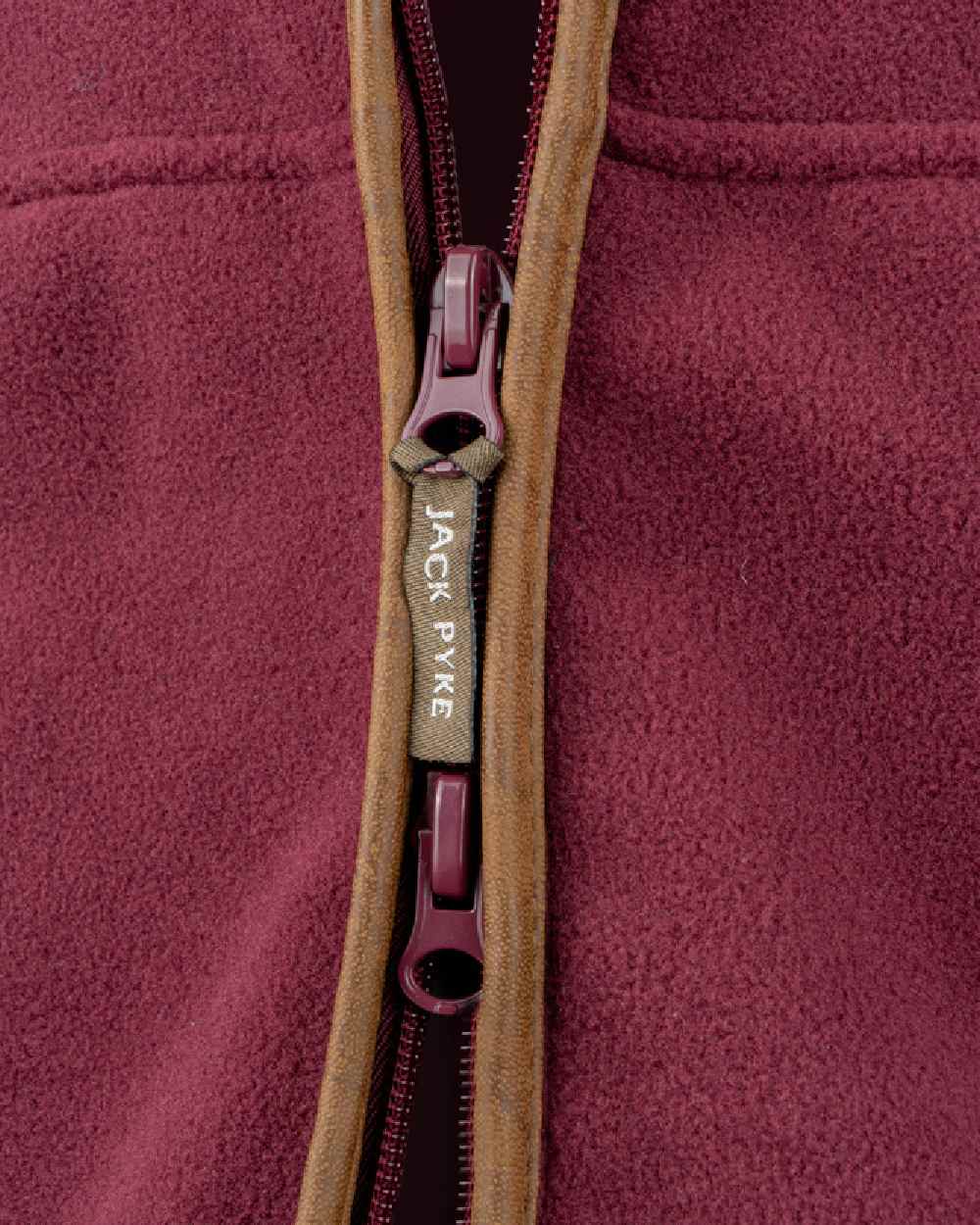 Burgundy coloured Jack Pyke Countryman Fleece Gilet on white background