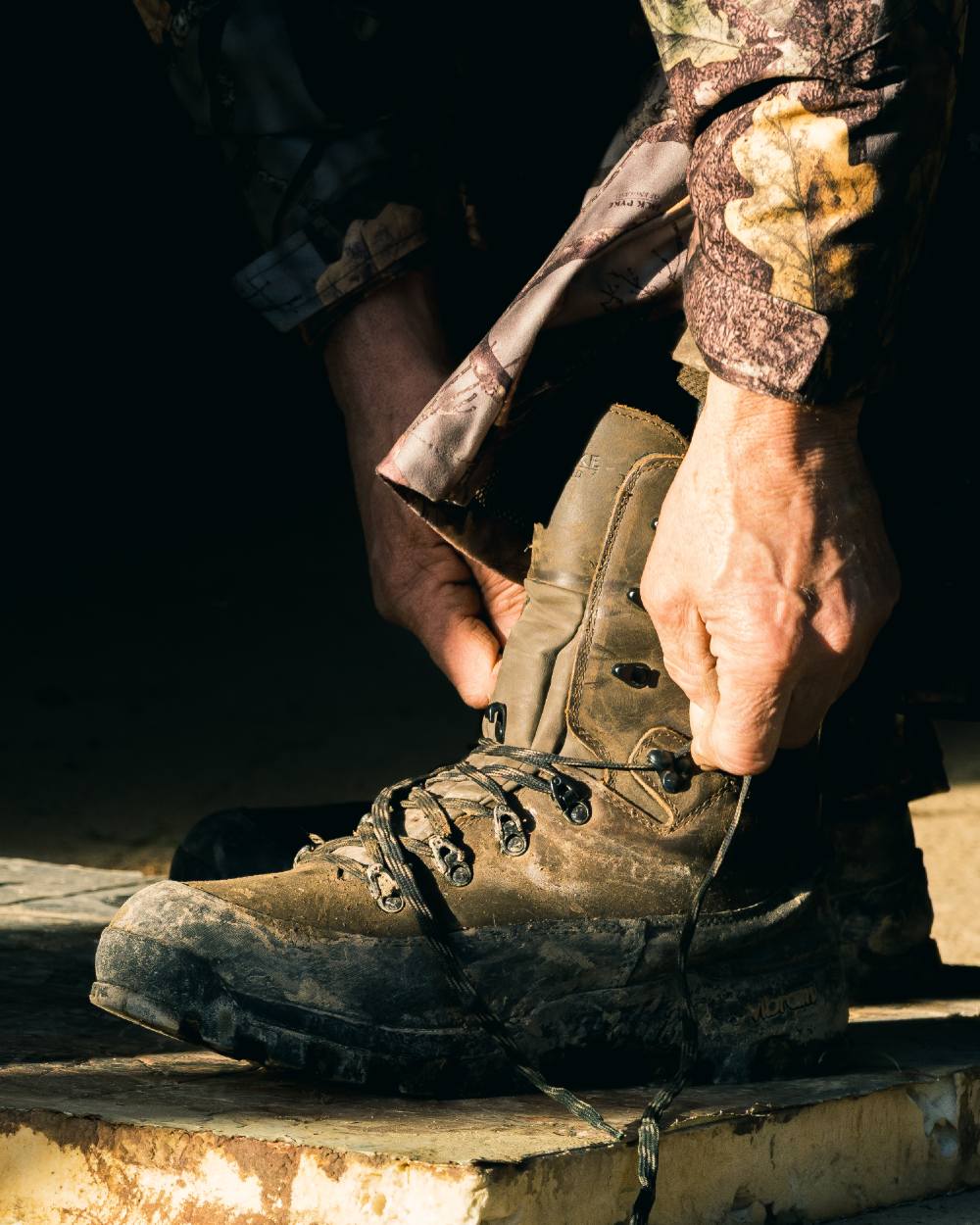 Brown coloured Jack Pyke Hunters Boots on outdoor background