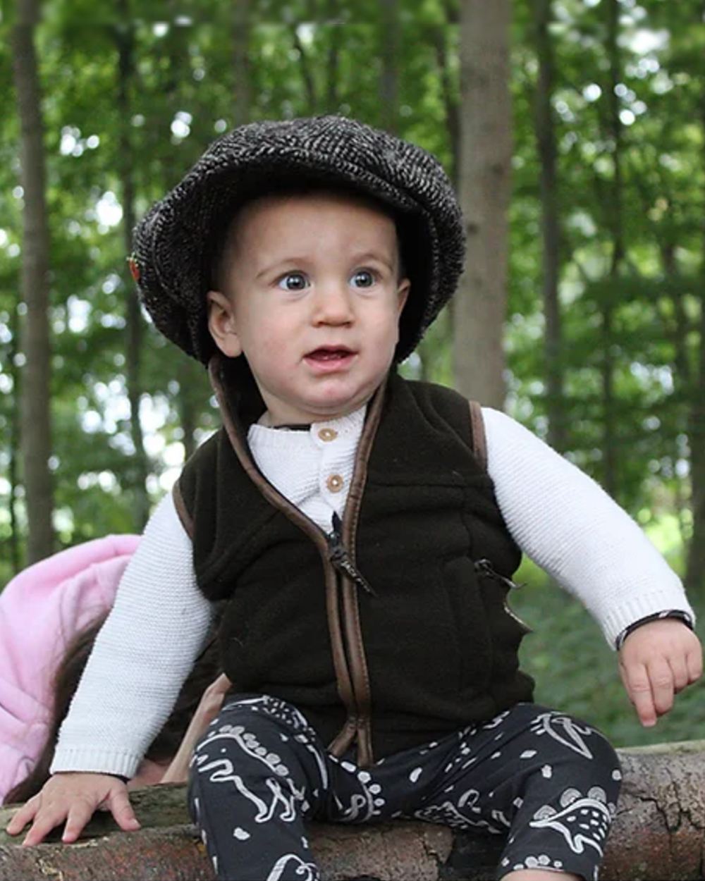Dark Olive coloured Jack Pyke Junior Countryman Gilet on forest background