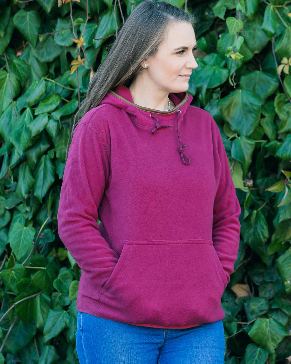 Roselle coloured Jack Pyke Ladies Fleece Hoodie on leafy background