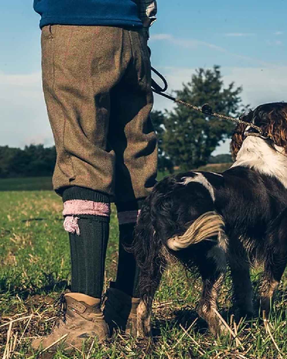 Green Pink coloured Jack Pyke Ladies Shooting Socks on grass background