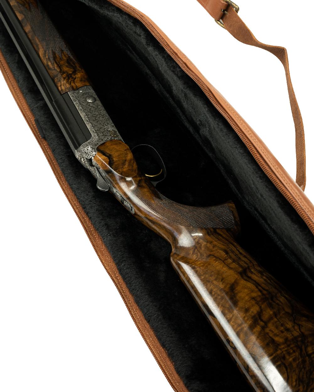 Tan coloured Jack Pyke Leather Shotgun Slip on white background