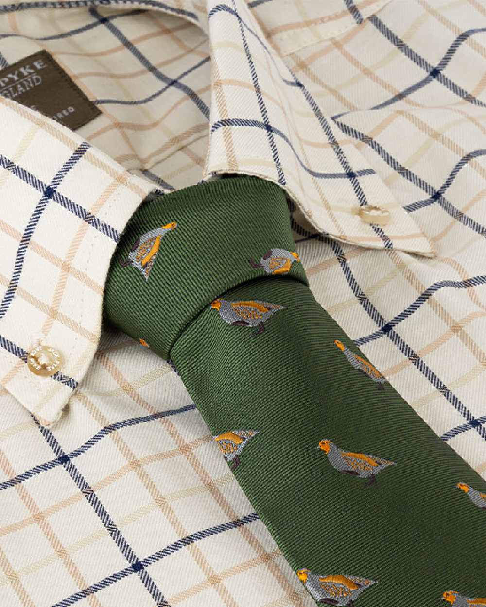 Green coloured Jack Pyke Shooting Tie Partridge on white background