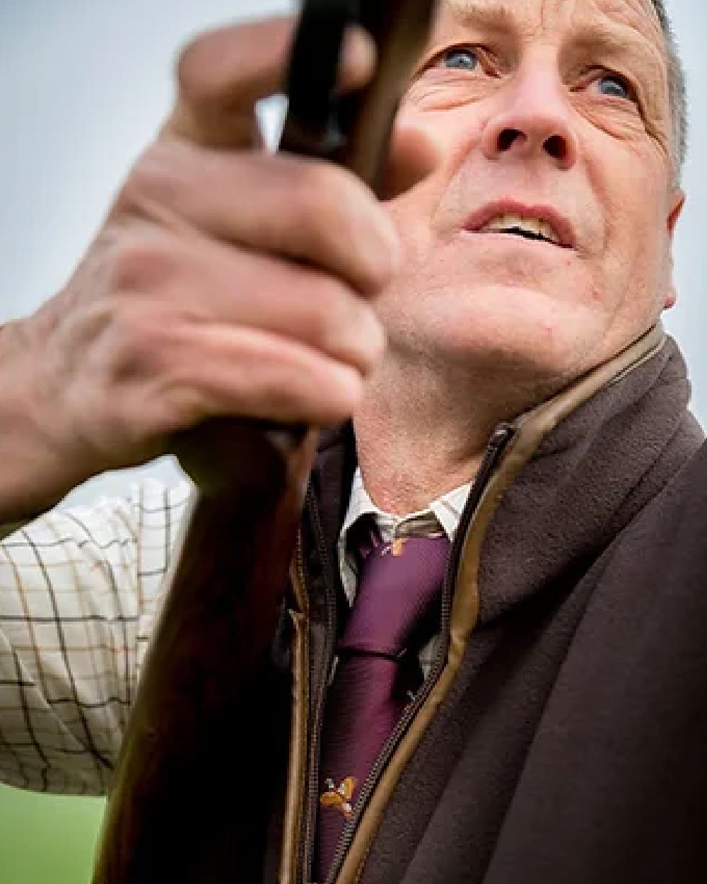 Wine coloured Jack Pyke Shooting Tie Pheasant on sky background