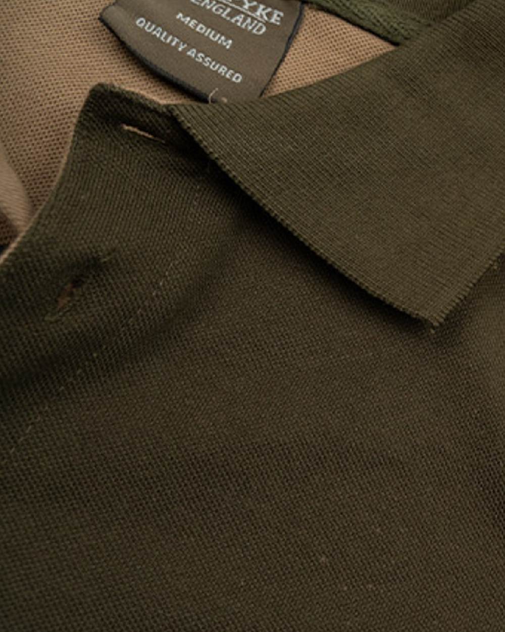 Green coloured Jack Pyke Sporting Polo Shirt on white background